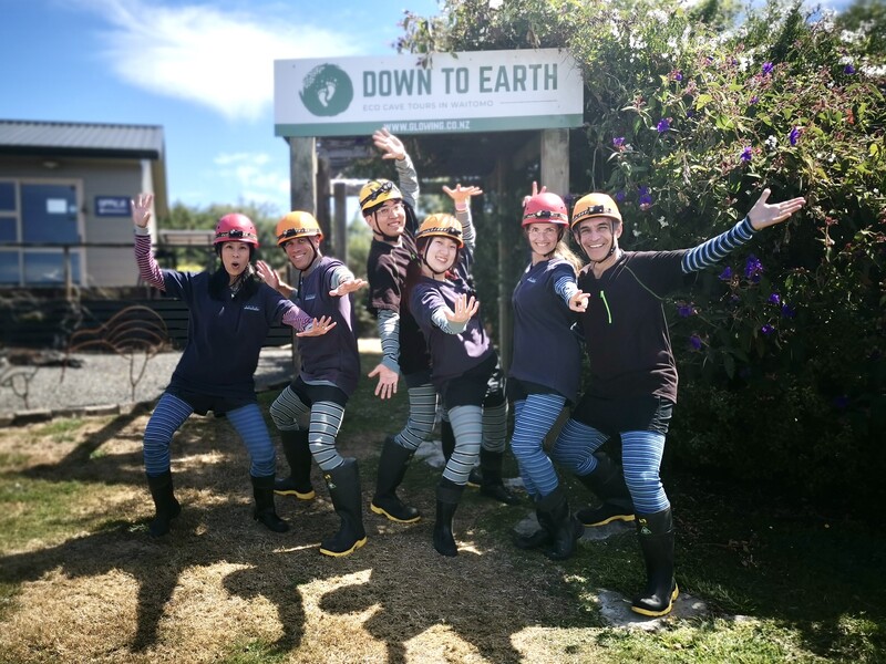 Photograph of Down to Earth sign and customers